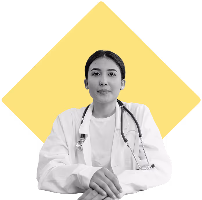 Doctor sitting, looking straight at the camera