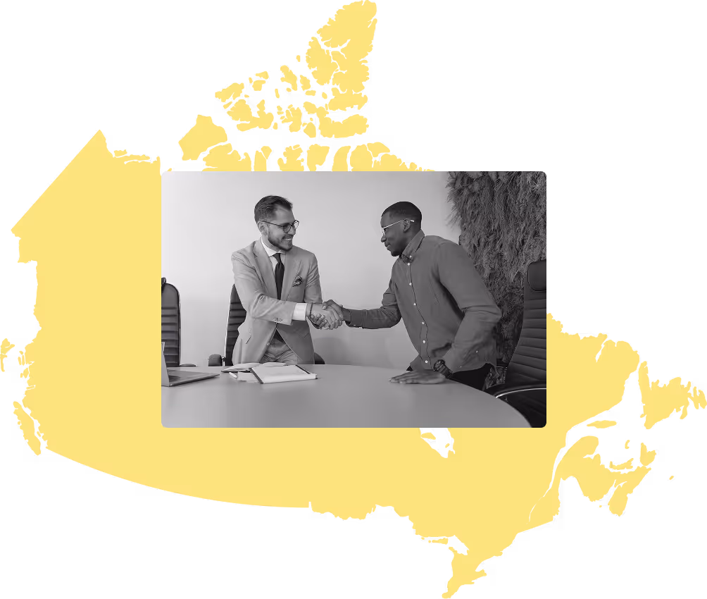 Business people shaking hands imposed on map of Canada