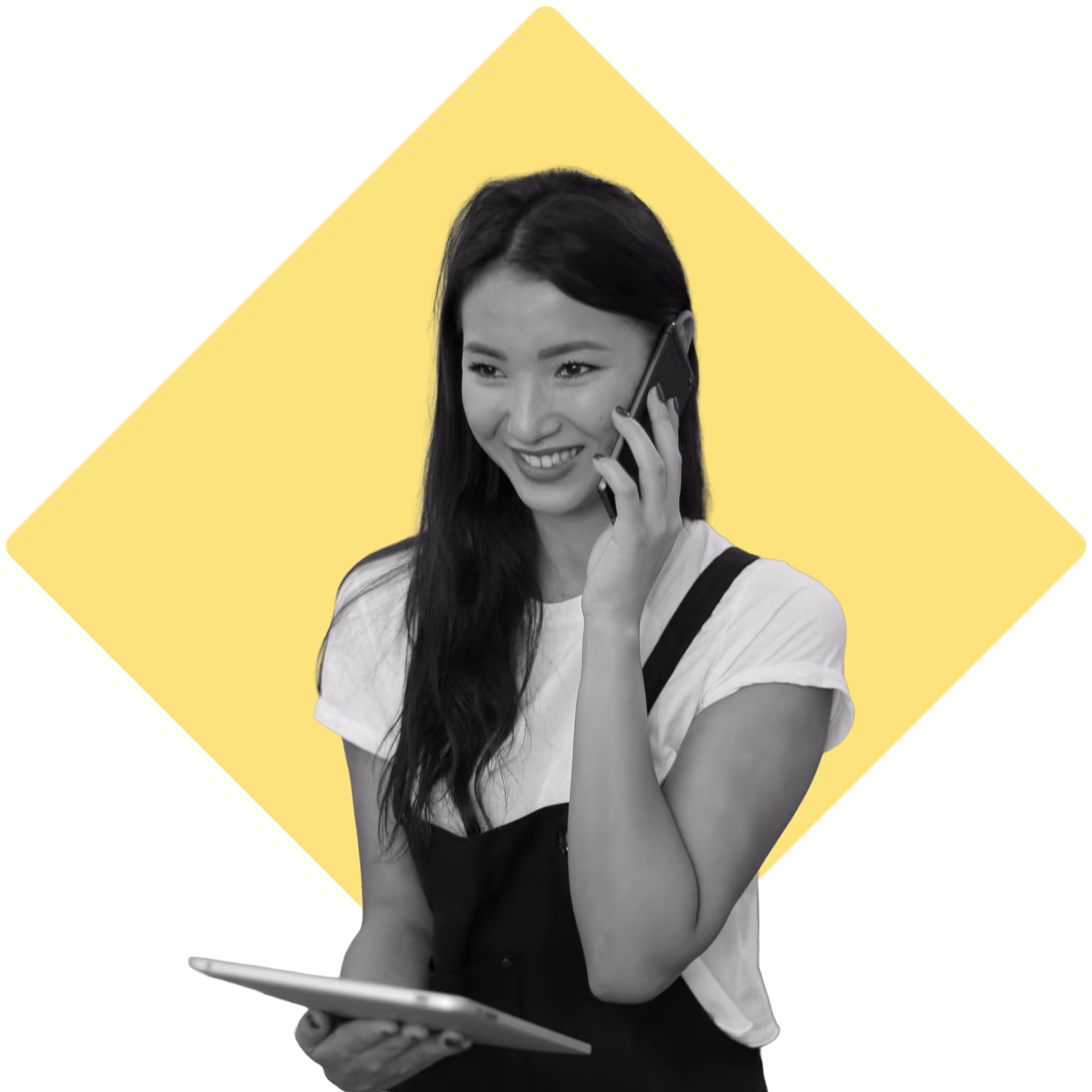 Restaurant worker on the phone smiling, holding an tablet